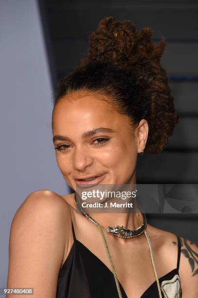 Actress Sasha Lane attends the 2018 Vanity Fair Oscar Party hosted by Radhika Jones at the Wallis Annenberg Center for the Performing Arts on March...