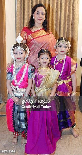 Veteran actress Hema Malini poses with kids at a dance event in Mumbai on Saturday, October 31, 2009.