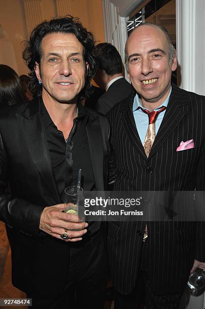 Stephen Webster and Mick Jones attend the Georgina Chapman for Garrard collection launch on November 4, 2009 in London, England.