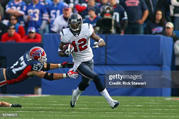 Jacoby Jones of the Houston Texans runs with the ball during the game against the Buffalo Bills at Ralph Wilson Stadium on November 1, 2009 in...