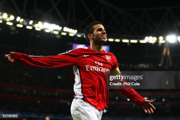 Cesc Fabregas of Arsenal celebrates scoring the third goal of the game during the UEFA Champions League Group H match between Arsenal and AZ Alkmaar...