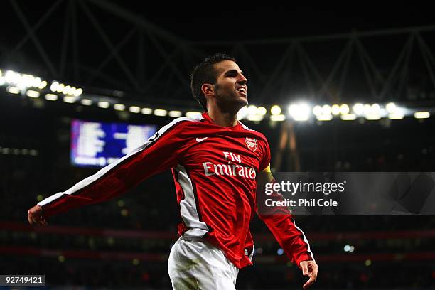 Cesc Fabregas of Arsenal celebrates scoring the third goal of the game during the UEFA Champions League Group H match between Arsenal and AZ Alkmaar...