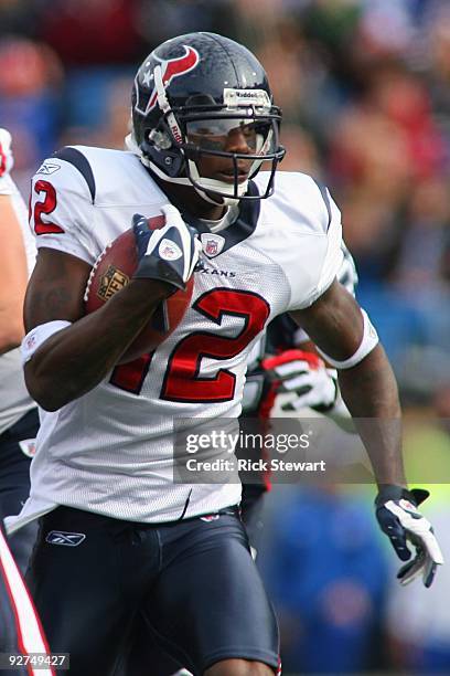 Jacoby Jones of the Houston Texans runs with the ball during the game against the Buffalo Bills at Ralph Wilson Stadium on November 1, 2009 in...