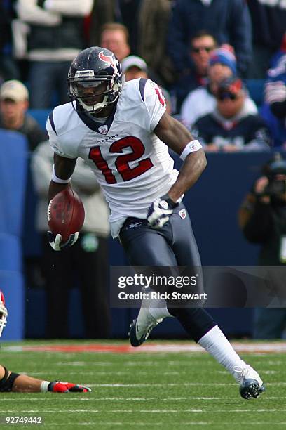 Jacoby Jones of the Houston Texans runs with the ball during the game against the Buffalo Bills at Ralph Wilson Stadium on November 1, 2009 in...