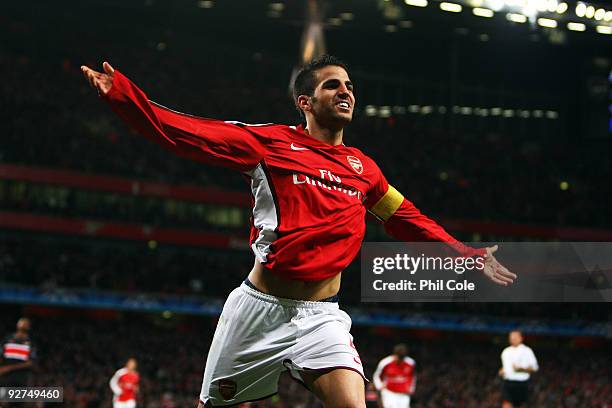 Cesc Fabregas of Arsenal celebrates scoring the third goal of the game during the UEFA Champions League Group H match between Arsenal and AZ Alkmaar...