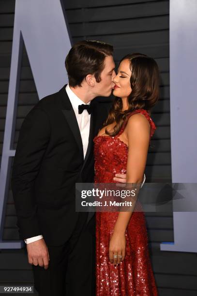 Miles Teller and Keleigh Sperry attend the 2018 Vanity Fair Oscar Party hosted by Radhika Jones at the Wallis Annenberg Center for the Performing...