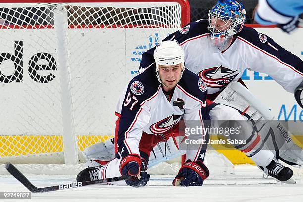 Defenseman Rostislav Klesla of the Columbus Blue Jackets attempts to block a shot by the Pittsburgh Penguins on October 30, 2009 at Nationwide Arena...