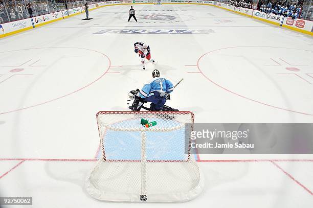 Forward Rick Nash of the Columbus Blue Jackets attempts a shot on goaltender Brent Johnson of the Pittsburgh Penguins during a shootout on October...
