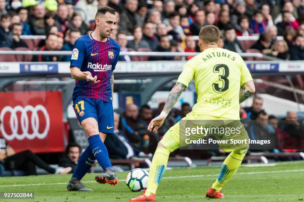 Francisco Alcacer Garcia, Paco Alcacer, of FC Barcelona fights for the ball with Vitorino Gabriel Pacheco Antunes of Getafe CF during the La Liga...