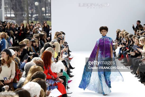 Model presents a creation for Leonard Paris during the 2018/2019 fall/winter collection fashion show on March 5, 2018 in Paris. / AFP PHOTO /...