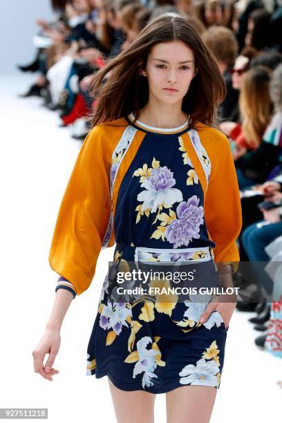 Model presents a creation for Leonard Paris during the 2018/2019 fall/winter collection fashion show on March 5, 2018 in Paris. / AFP PHOTO /...