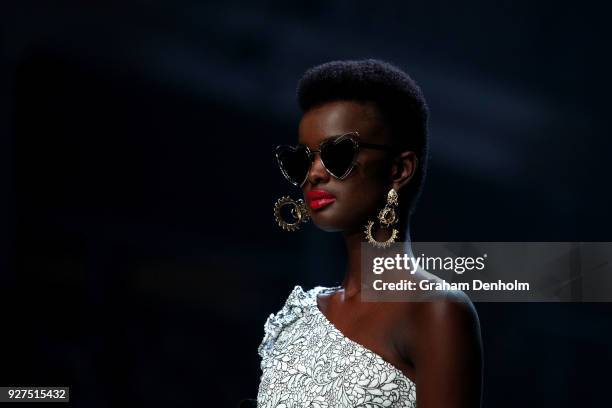 Model showcases designs during VAMFF Runway Gala Presented by David Jones on March 5, 2018 in Melbourne, Australia.