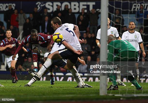 Zavon Hines of West Ham scores West Ham's second goal past goalkeeper Brad Friedel of Aston Villa during the Barclays Premier League match between...