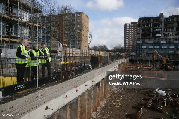 British Prime Minister, Theresa May visits a housing development on March 5, 2018 in East London, England.