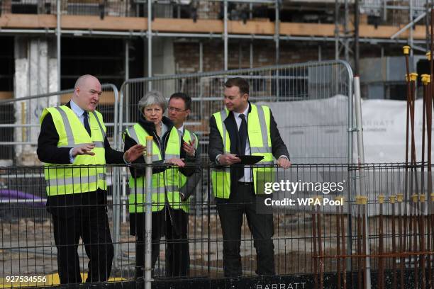 British Prime Minister, Theresa May visits a housing development on March 5, 2018 in East London, England.