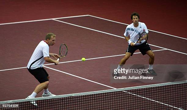 Lukas Dlouhy of Czech Republic and Philipp Kohlschreiber of Germany in action in their doubles match against Jonathan Erlich and Andy Ram of Israel...