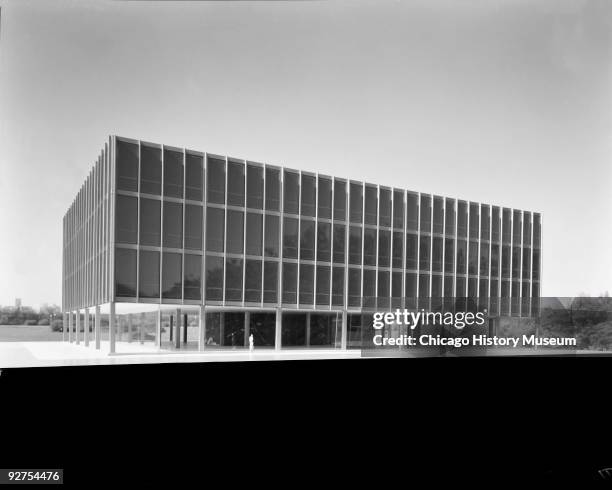 Unidentified model for 3-story modern building, designed by Mies van der Rohe, photographed with a park in the background, Chicago, IL, June 1940....