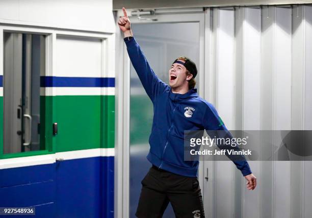 Ben Hutton of the Vancouver Canucks smiles as he warms up before their NHL game against the Florida Panthers at Rogers Arena February 14, 2018 in...