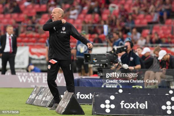 Kenneth Lowe coach of Perth Glory shouts instructions to his team during the round 23 A-League match between the Western Sydney Wanderers and Perth...