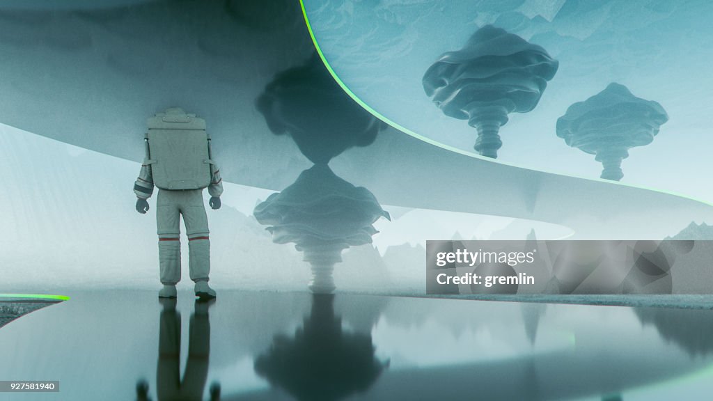 Astronaut walking on futuristic road on alien planet