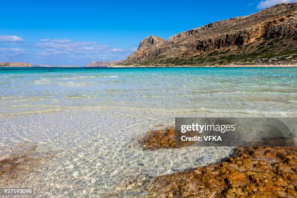vibrant blue balos beach lagoon, gramvousa, crete, greece - balos lagoon stock pictures, royalty-free photos & images