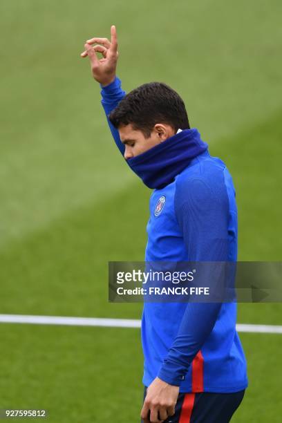 Paris Saint-Germain's Brazilian defender Thiago Silva gestures during a training session on March 5, 2018 at the Ooredoo training center in...