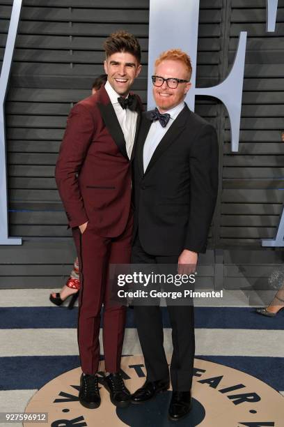 Justin Mikita and Jesse Tyler Ferguson attend the 2018 Vanity Fair Oscar Party hosted by Radhika Jones at Wallis Annenberg Center for the Performing...