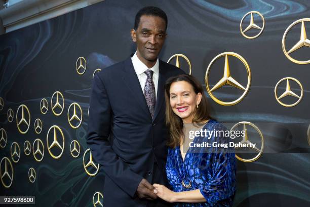 Former NBA Player Ralph Sampson and Patrice Ablack attend the Mercedez-Benz USA's Official Awards Viewing Party at Four Seasons Hotel Los Angeles at...