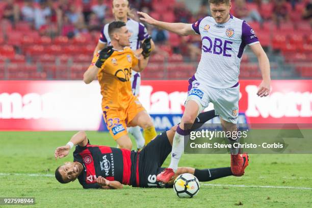 Jaushua Sotirio of the Wanderers taken out of play by Glory's goalkeeper Liam Reddy during the round 23 A-League match between the Western Sydney...