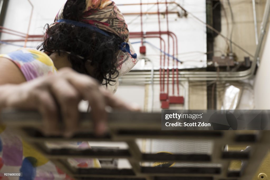 Female artist working in workshop