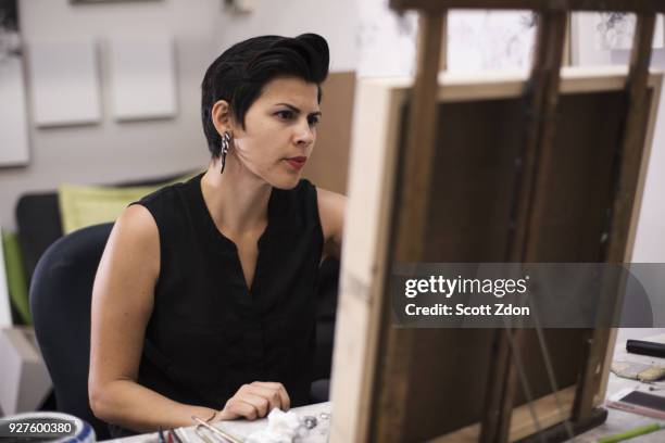 artist painting in her studio - scott zdon bildbanksfoton och bilder