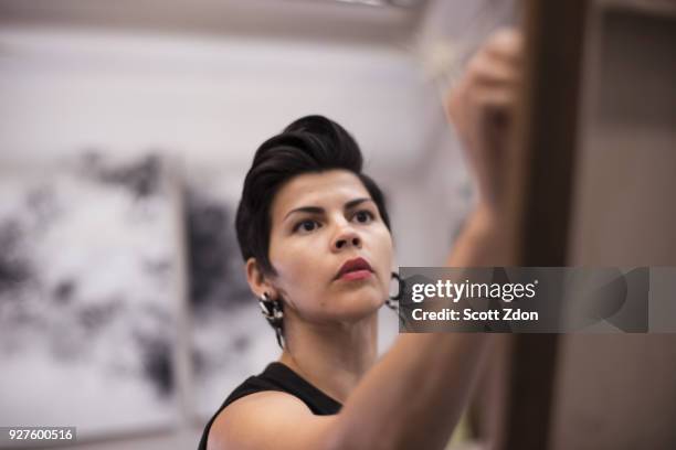 artist painting in her studio - scott zdon bildbanksfoton och bilder