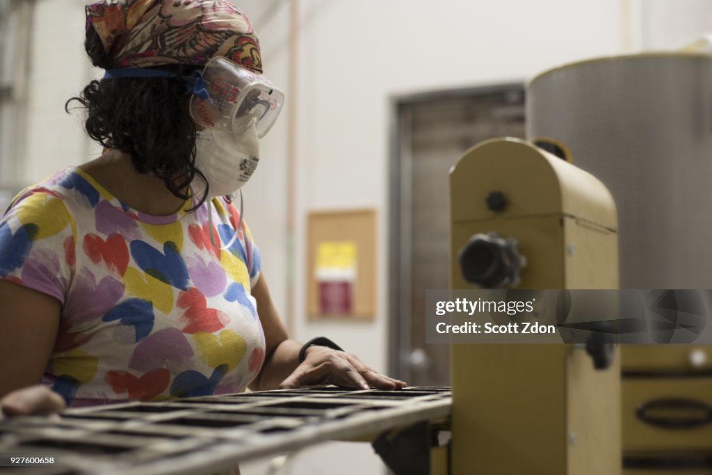 Female artist working in workshop