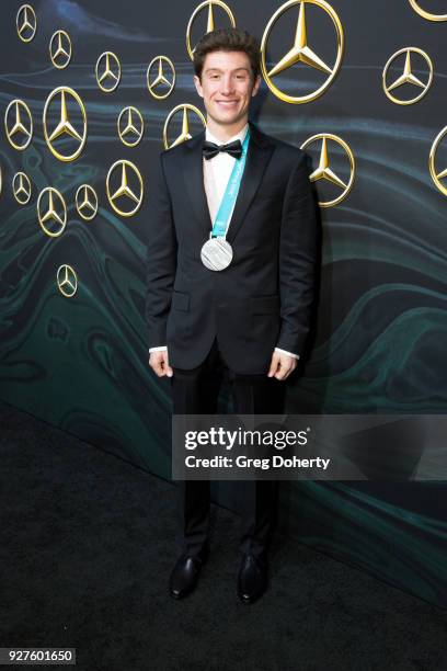 Former Olympian Alex Ferreira attends the Mercedez-Benz USA's Official Awards Viewing Party at Four Seasons Hotel Los Angeles at Beverly Hills on...