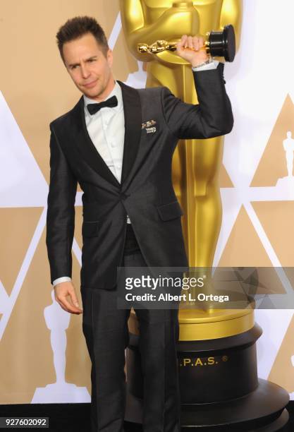 Actor Sam Rockwell, winner of the Best Supporting Actor award for 'Three Billboards Outside Ebbing, Missouri' poses inside the Press Room of the 90th...