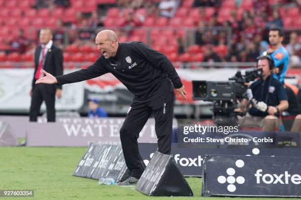 Kenneth Lowe coach of Perth Glory shouts instructions to his team during the round 23 A-League match between the Western Sydney Wanderers and Perth...