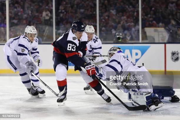 Jay Beagle of the Washington Capitals in action against the Toronto Maple Leafs during the third period in the Coors Light NHL Stadium Series at...
