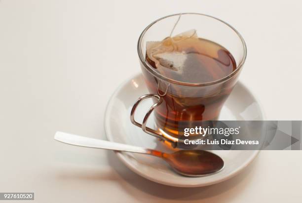 rooibos tea glass cup - herbal tea bag stock pictures, royalty-free photos & images