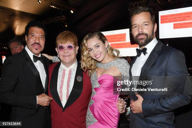 Lionel Richie, Sir Elton John, Miley Cyrus, and Ricky Martin attend Elton John AIDS Foundation 26th Annual Academy Awards Viewing Party on March 4,...