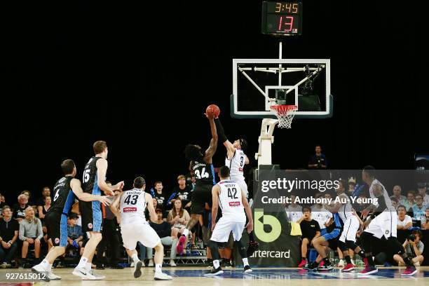 Josh Boone of United blocks the shot from Rakeem Christmas of the Breakers during game two of the NBL semi final series between Melbourne United and...