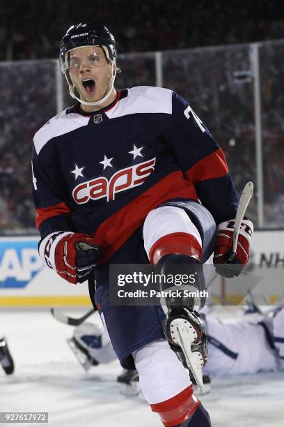 John Carlson of the Washington Capitals celebrates his goal against the Toronto Maple Leafs during the second period in the Coors Light NHL Stadium...