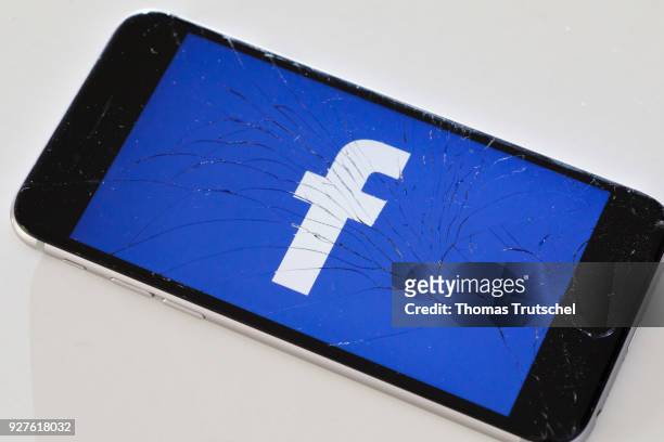 Berlin, Germany The logo of Facebook is displayed on a smartphone with splintered glass on March 05, 2018 in Berlin, Germany.