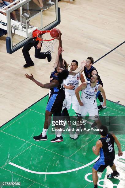 Rakeem Christmas of the Breakers dunks on Craig Moller of United during game two of the NBL semi final series between Melbourne United and the New...