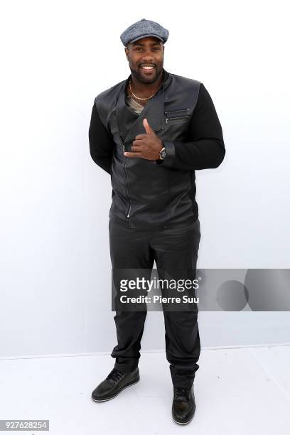 Teddy Riner attends the Leonard Paris show as part of the Paris Fashion Week Womenswear Fall/Winter 2018/2019 on March 5, 2018 in Paris, France.