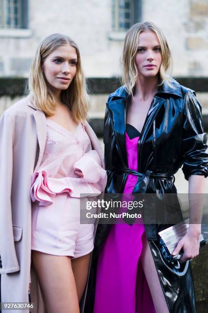 Lena Perminova and Anne V, are seen in the streets of Paris after the Valentino show during Paris Fashion Week Womenswear Fall/Winter 2018/2019 on...