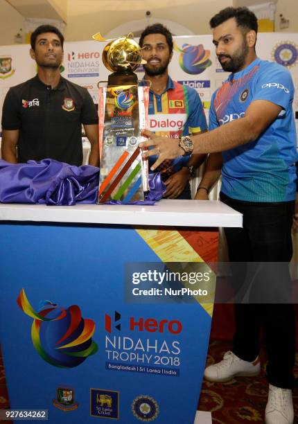 Bangladesh cricket captain Mohammad Mahmudullah Riyad , Sri Lankan cricket captain Dinesh Chandimal and Indian cricket captain Rohit Sharma pose for...