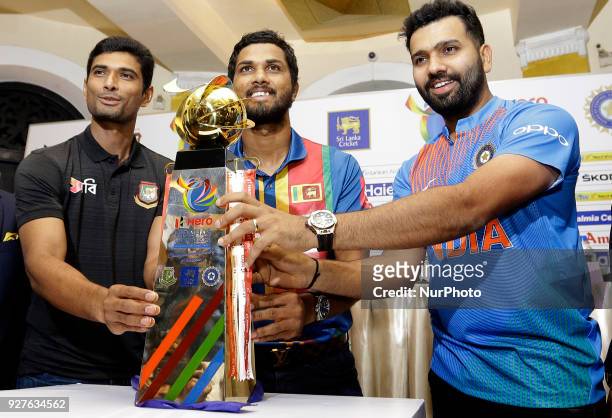 Bangladesh cricket captain Mohammad Mahmudullah Riyad , Sri Lankan cricket captain Dinesh Chandimal and Indian cricket captain Rohit Sharma pose for...