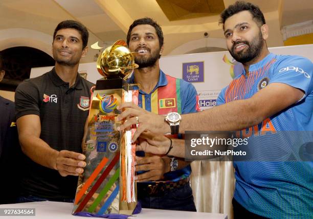 Bangladesh cricket captain Mohammad Mahmudullah Riyad , Sri Lankan cricket captain Dinesh Chandimal and Indian cricket captain Rohit Sharma pose for...