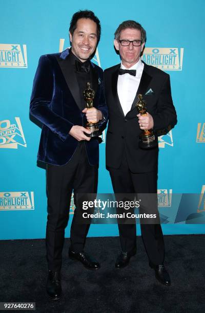 Production designer Paul Austerberry and set designer Jeffrey A. Melvin attend the Fox Searchlight And 20th Century Fox Oscars Post-Party on March 4,...