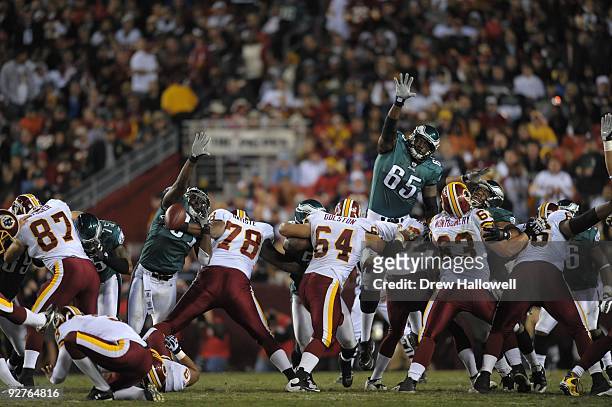 Tackle King Dunlap of the Philadelphia Eagles jumps to block a field goal during the game against the Washington Redskins on October 26, 2009 at...
